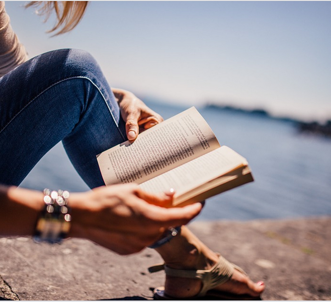 a lady reading a book
